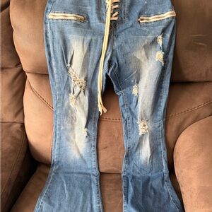 Fashion Nova Distressed Blue Lace-Up Flare Jeans